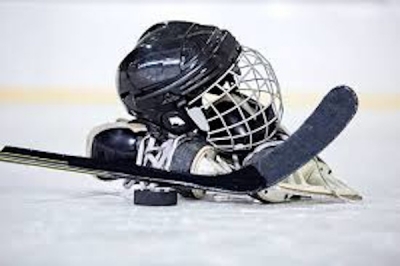 Hockey Helmet, Puck and Stick on Ice